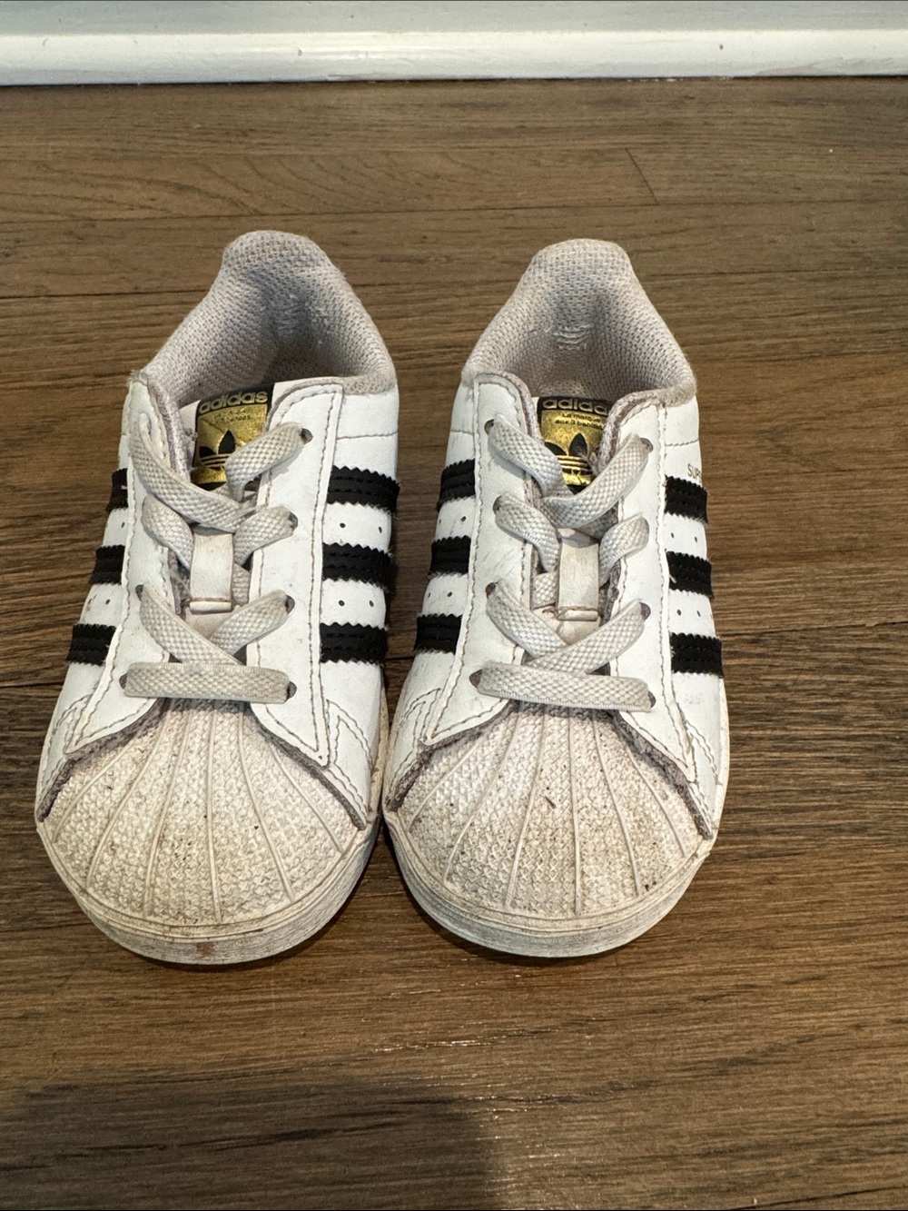 adidas Kids White Sneakers with Black Stripes